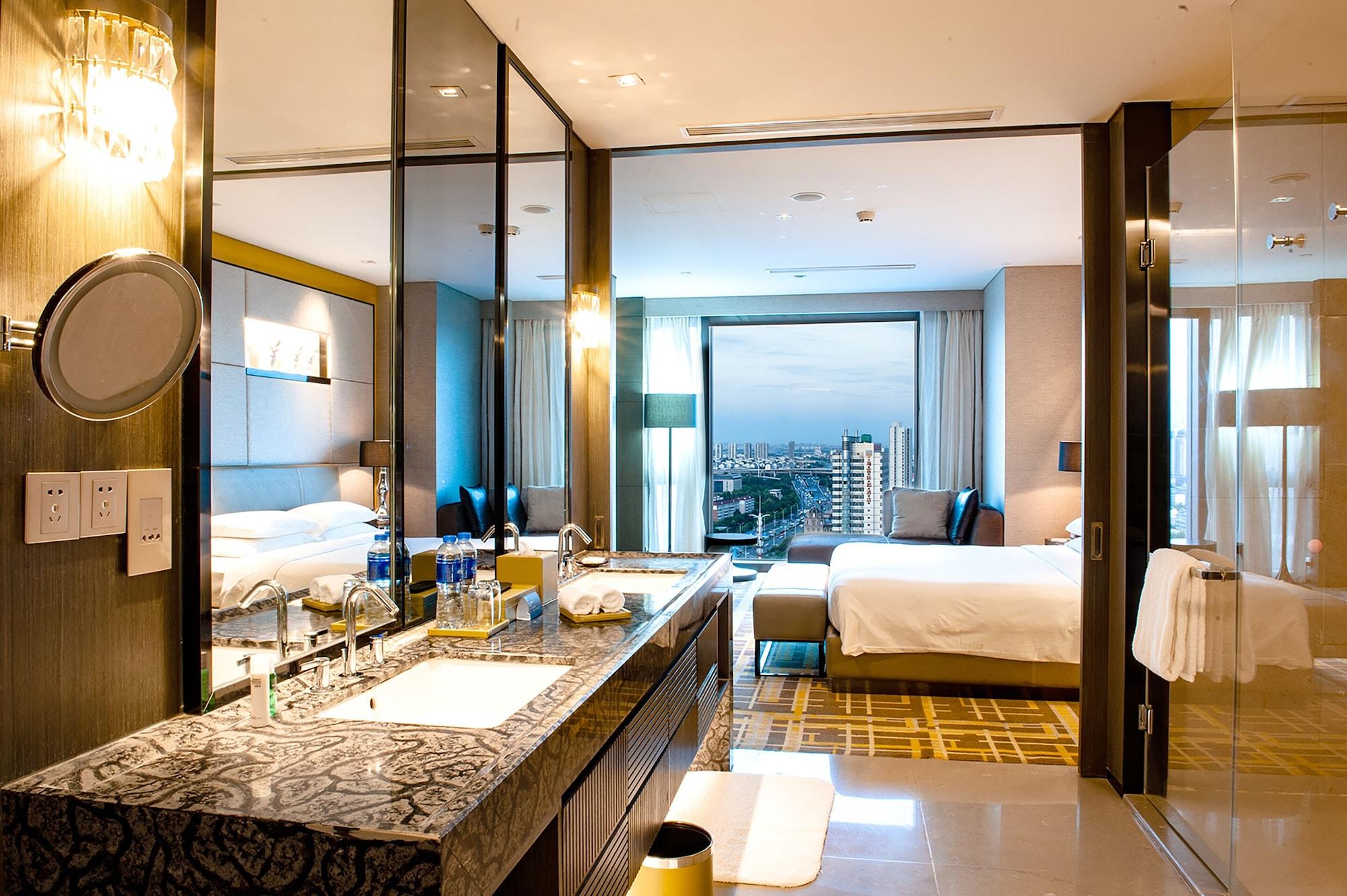 Hyatt Regency Tianjin East Hotel Bagian luar foto