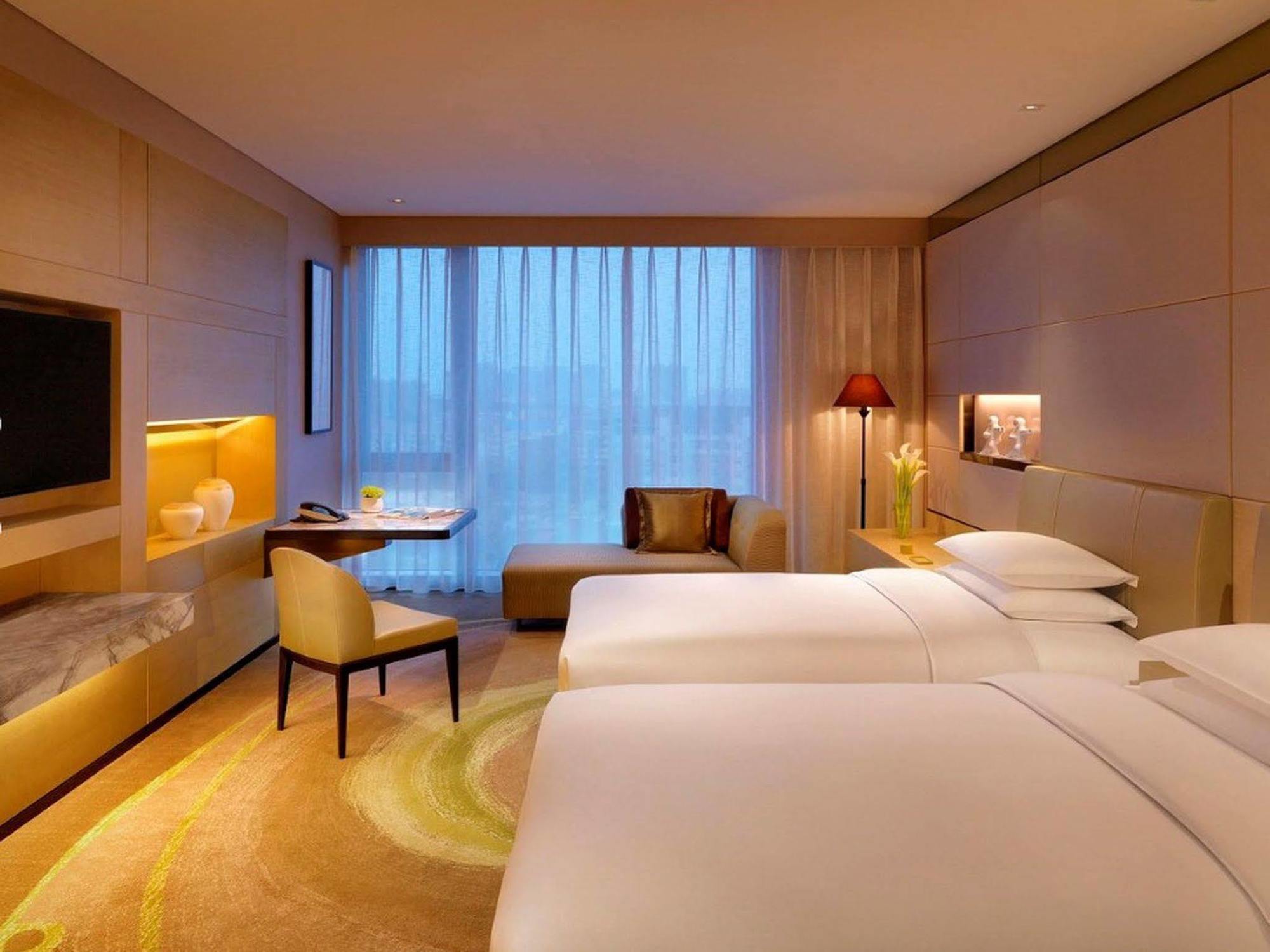 Hyatt Regency Tianjin East Hotel Bagian luar foto